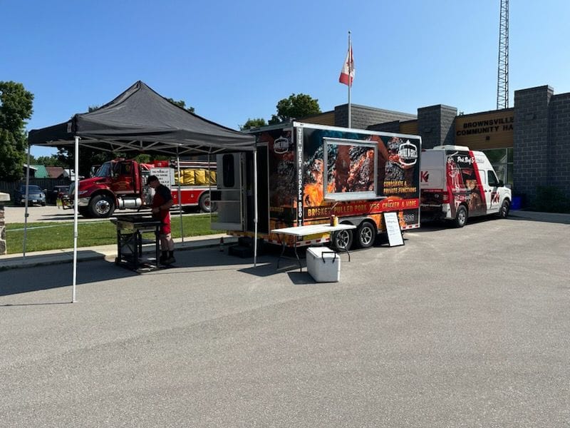 Smoke N Grill food trailer and van at event setup